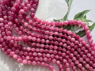 Нить бусин из тонированного кварца 6,4мм, гладкие