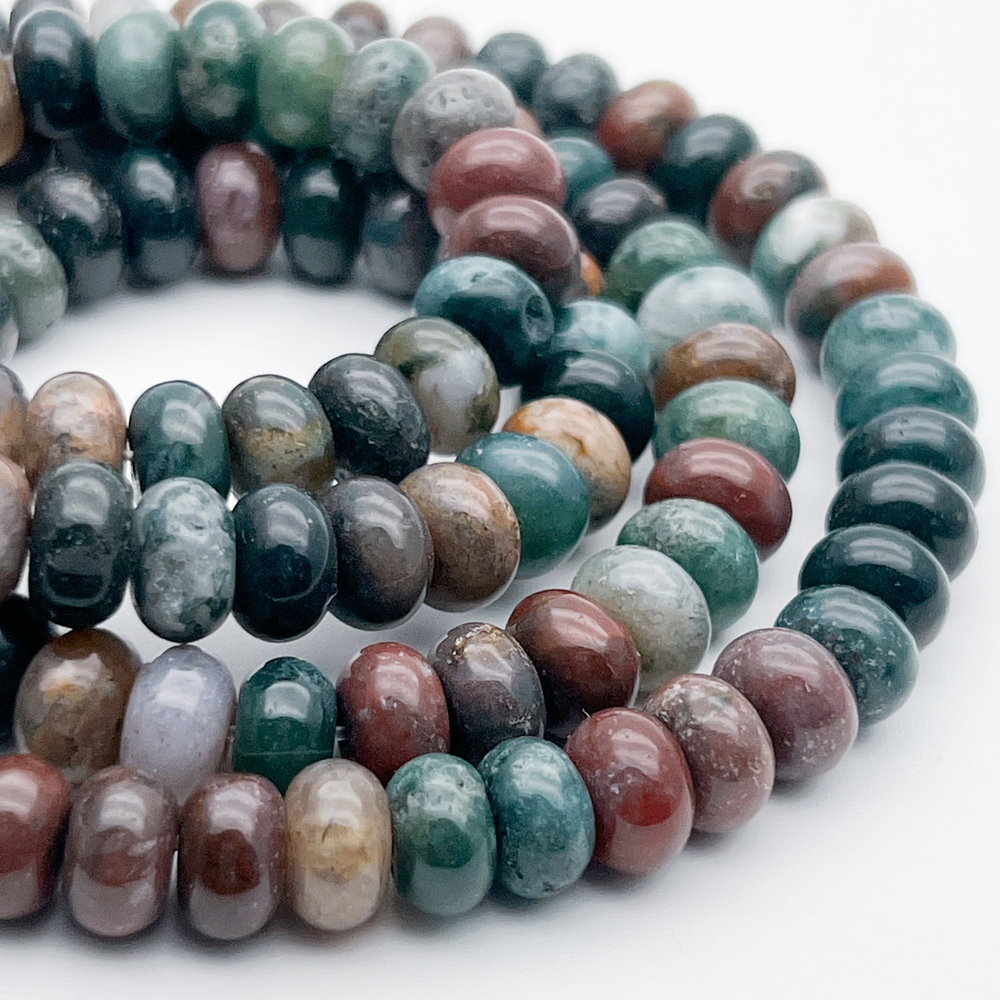 "Индийский агат" бусины (халцедон), размер около 5*8 мм, цена за 17-18 шт (1/4 нити)