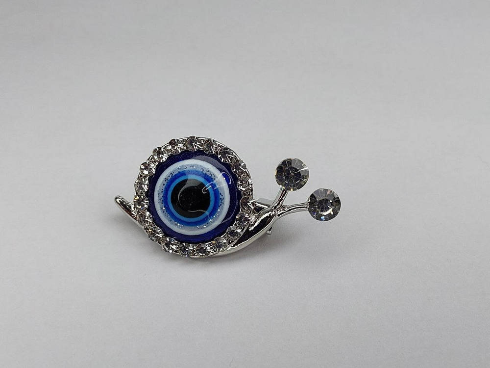 Брошка. Улитка. Глаз Фатимы. цвет " Серебро"