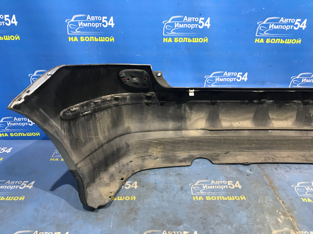 Бампер задний NISSAN TINO 1998-2003