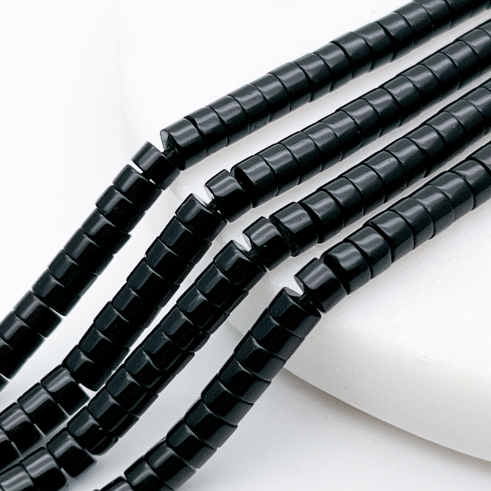 Халцедон тонированный черный бусины, размер около 4*2 мм, цена за 37-38 шт (1/4 нити)