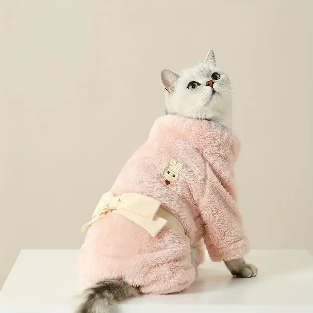 Плюшевый комбинезон в нежно розовом оттенке