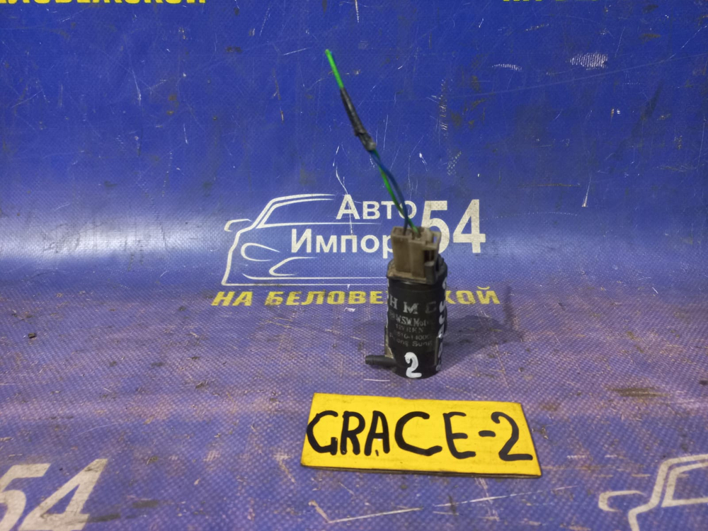 Моторчик бачка омывателя HYUNDAI Grace 1995