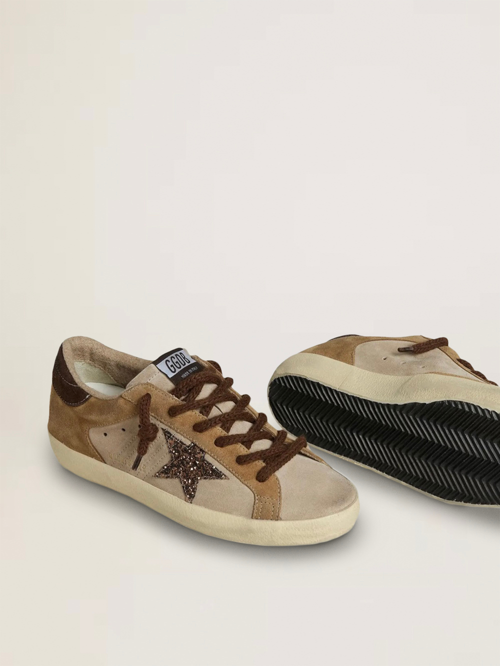 Super Star in beige and brown suede with a dark brown glitter star