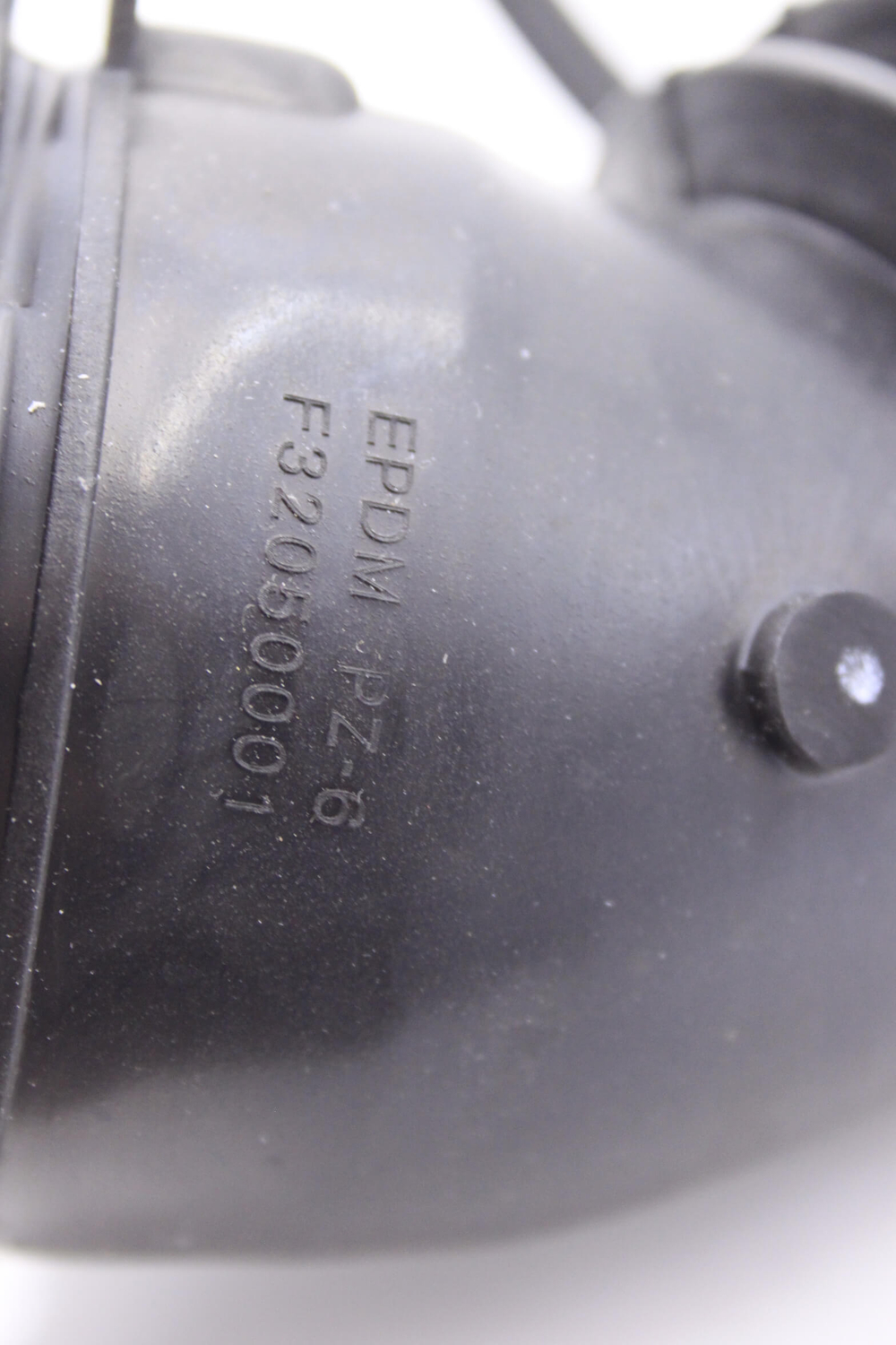 Патрубок стиральной машины от бака к насосу F32050001