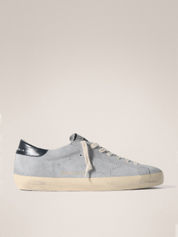 Men's Super Strar in light blue suede with a blue insert on the heel and a perforated star