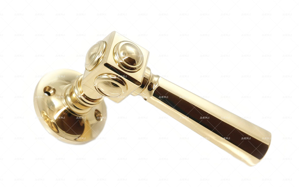 Ручка латунь нажимная Грани полированная латунь