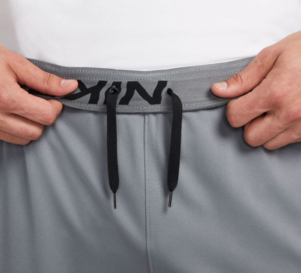 Мужские теннисные штаны Nike Totality Dri-FIT Tapered Versatile - серый