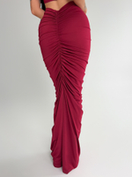 Костюм Dzhadagaevs 20112 из удлиненной юбки и топа с драпировкой