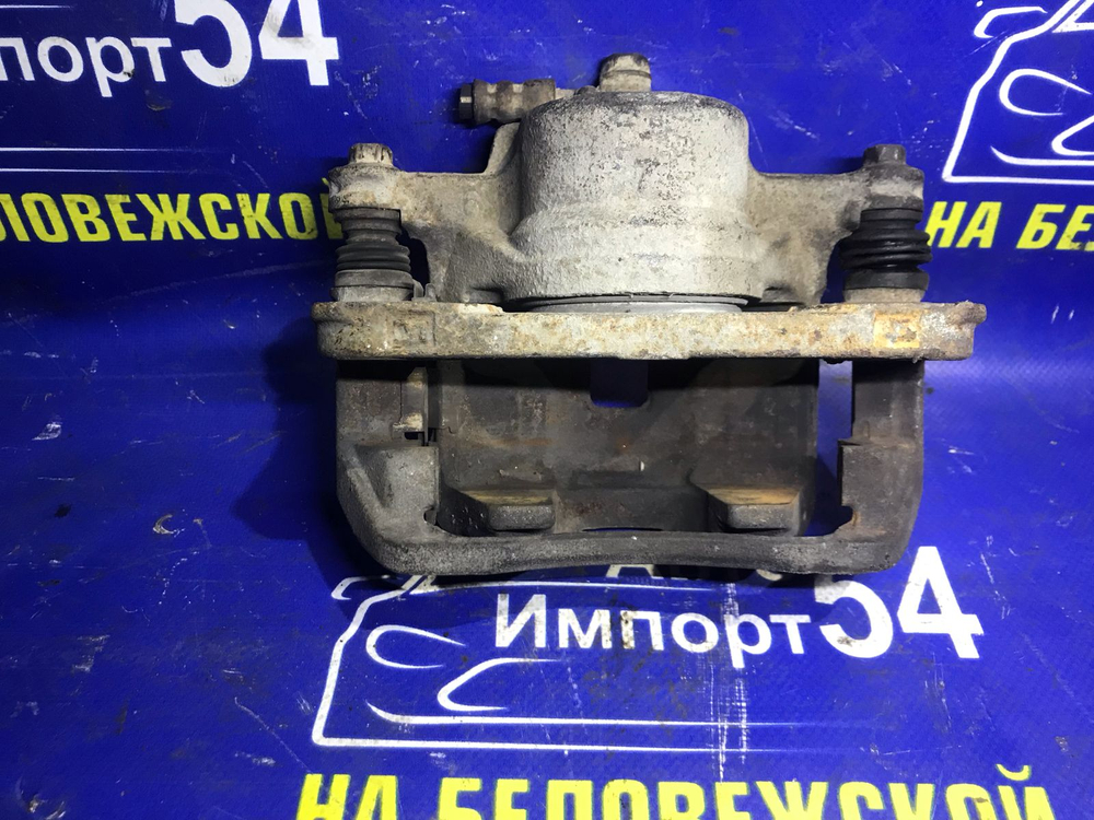 Суппорт тормозной передний левый Honda INTEGRA 1995
