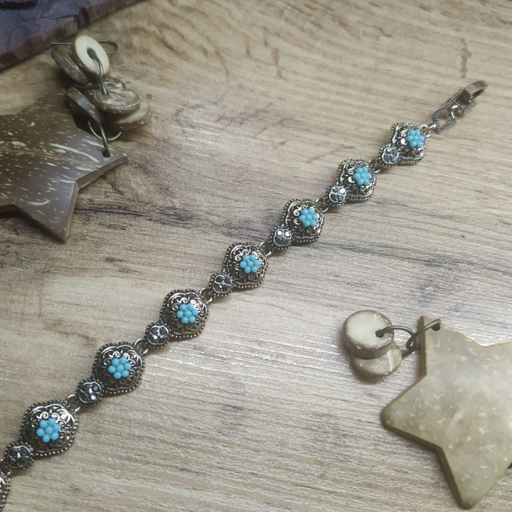 Браслет Vogue Клевер вензеля бусинки голубые металл золотистый на красном бархате