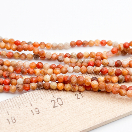 Коралл окаменелый граненый, размер около 3-3,1 мм, цена за отрезок 19 см (1/2 нити)