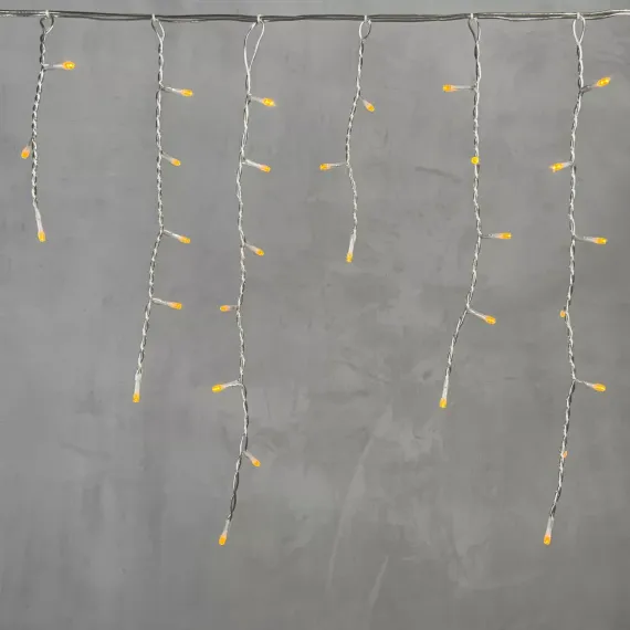 Светодиодная бахрома 3*0,5 м., 150 желтых LED ламп, силиконовый прозрачный провод, Beauty Led (ECC150-10-2Y)