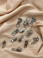 Собачка (бегунок) серебристая