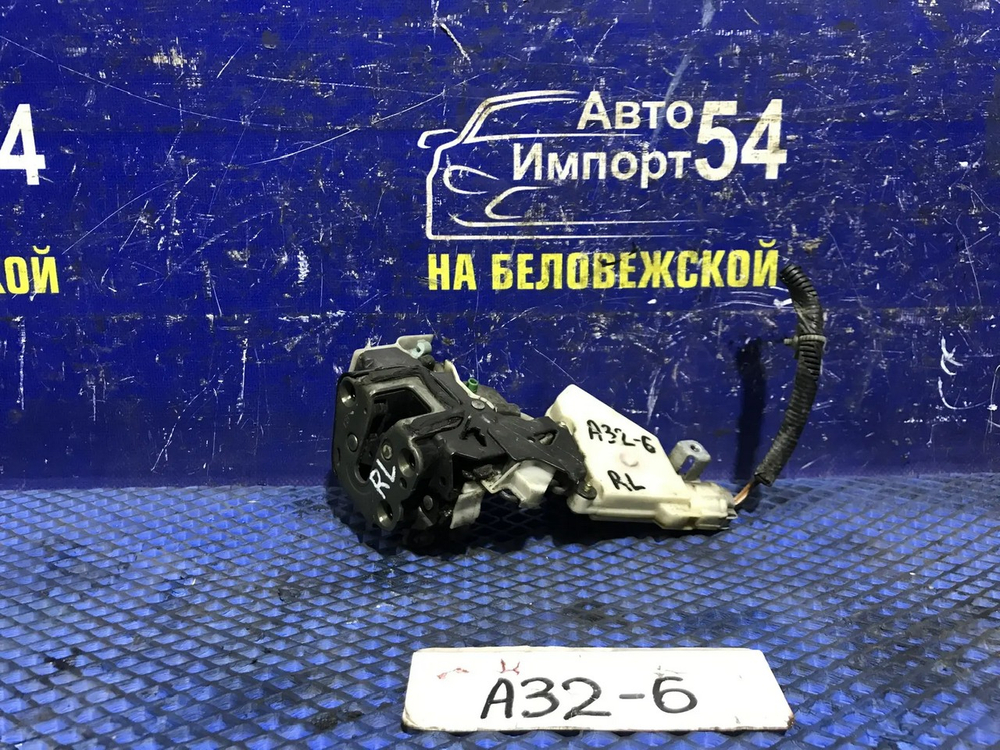 Замок двери задней левой NISSAN CEFIRO 1994