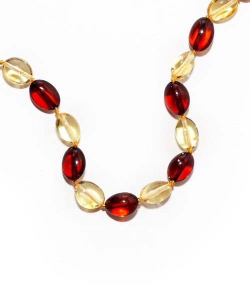 Бусы из янтаря натурального. Длина 45 см, бусины 10 на 7 мм. Янтарные бусы женские лечебные