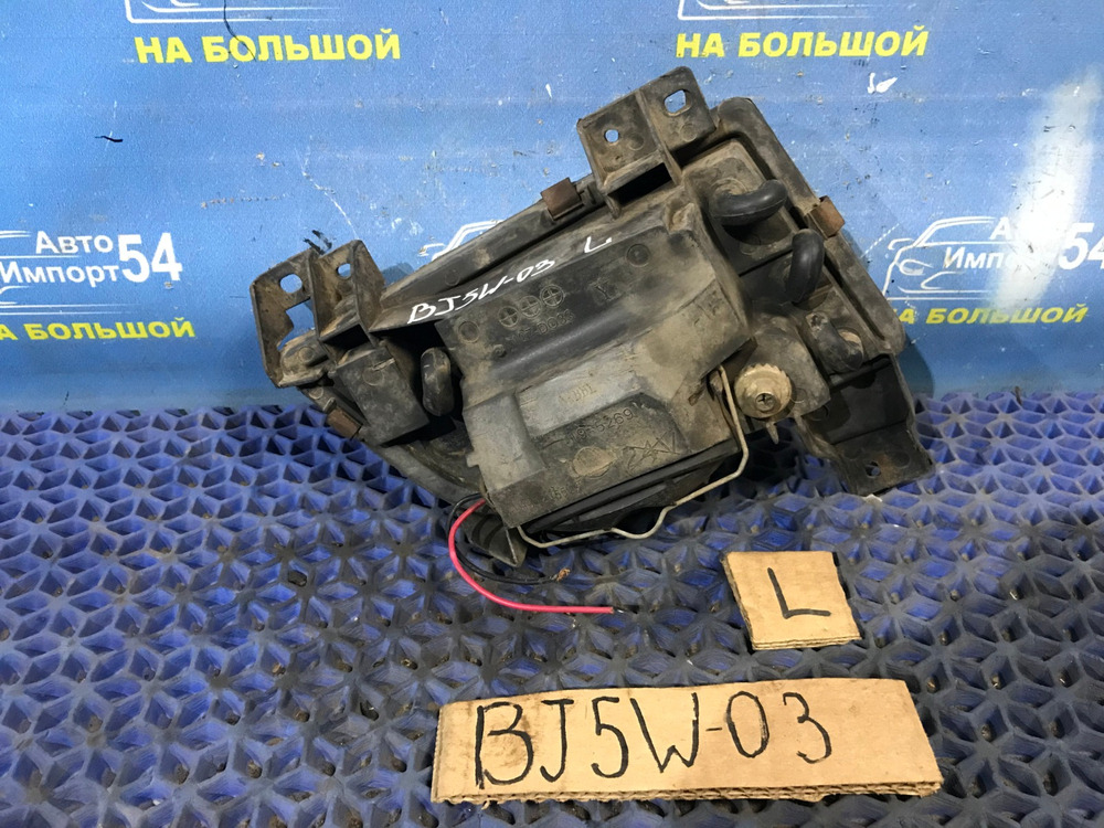 Туманка левая MAZDA FAMILIA 2001