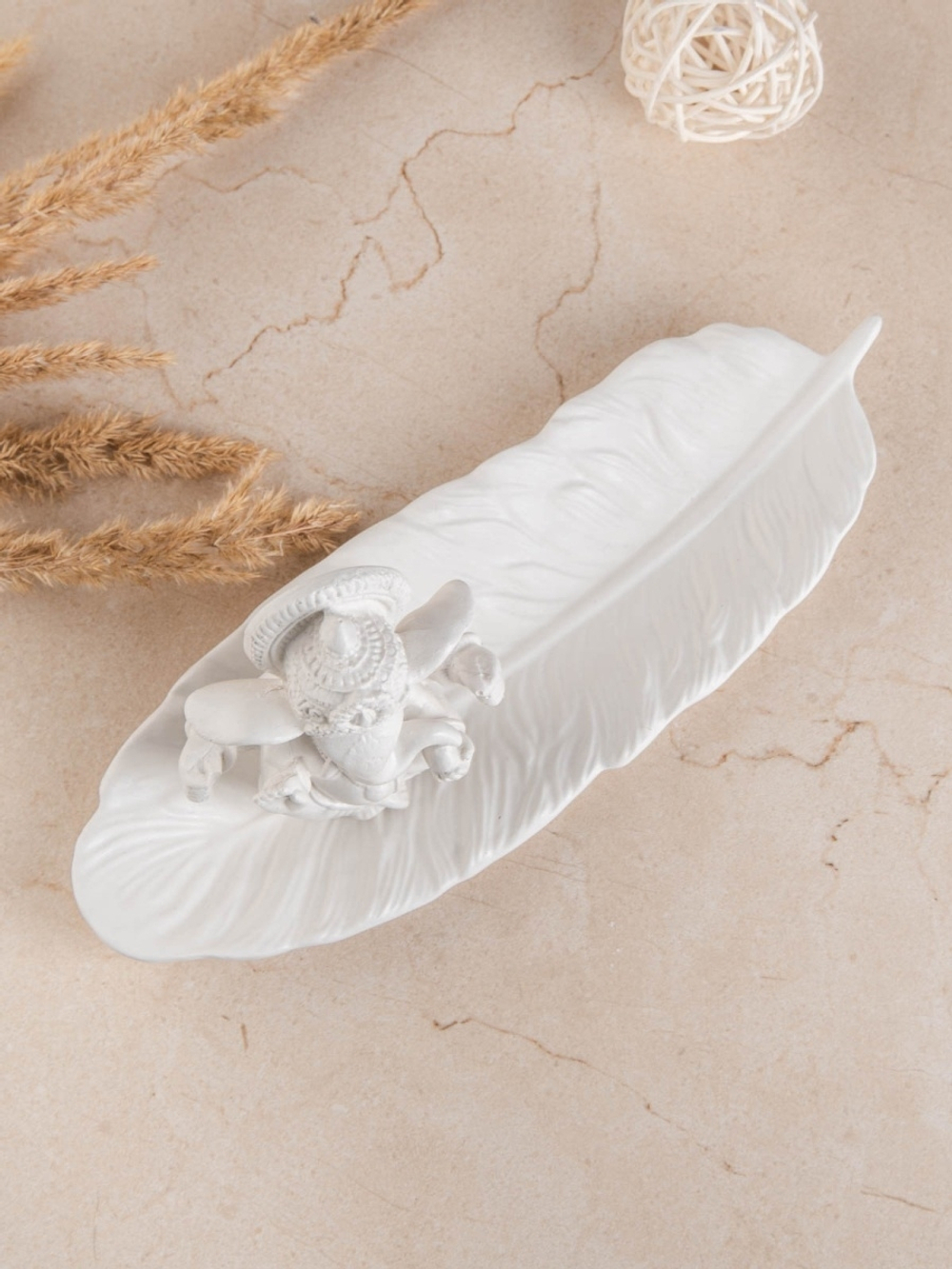 Статуэтка Ганеша на подставке лист