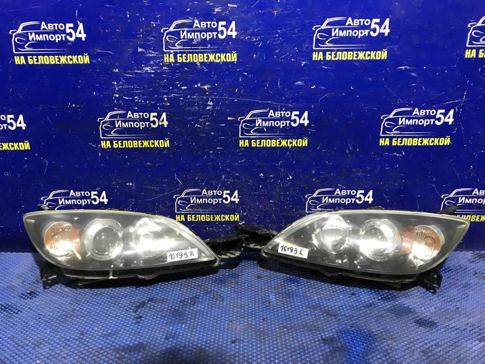 Фара передняя левая MAZDA AXELA 2003-2006