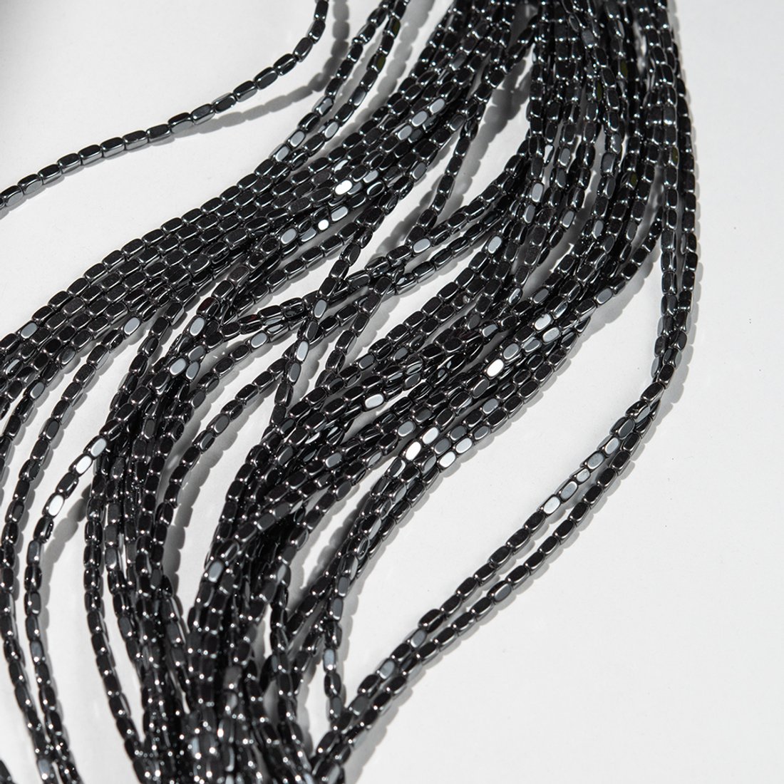 Гематин (гематит), оттенок "Gun Metal", рис с гранями, 2*4мм