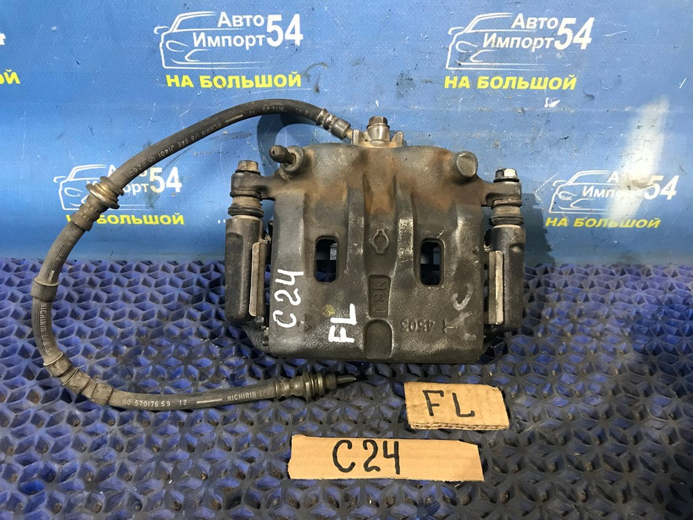 Суппорт тормозной передний левый NISSAN SERENA 2000