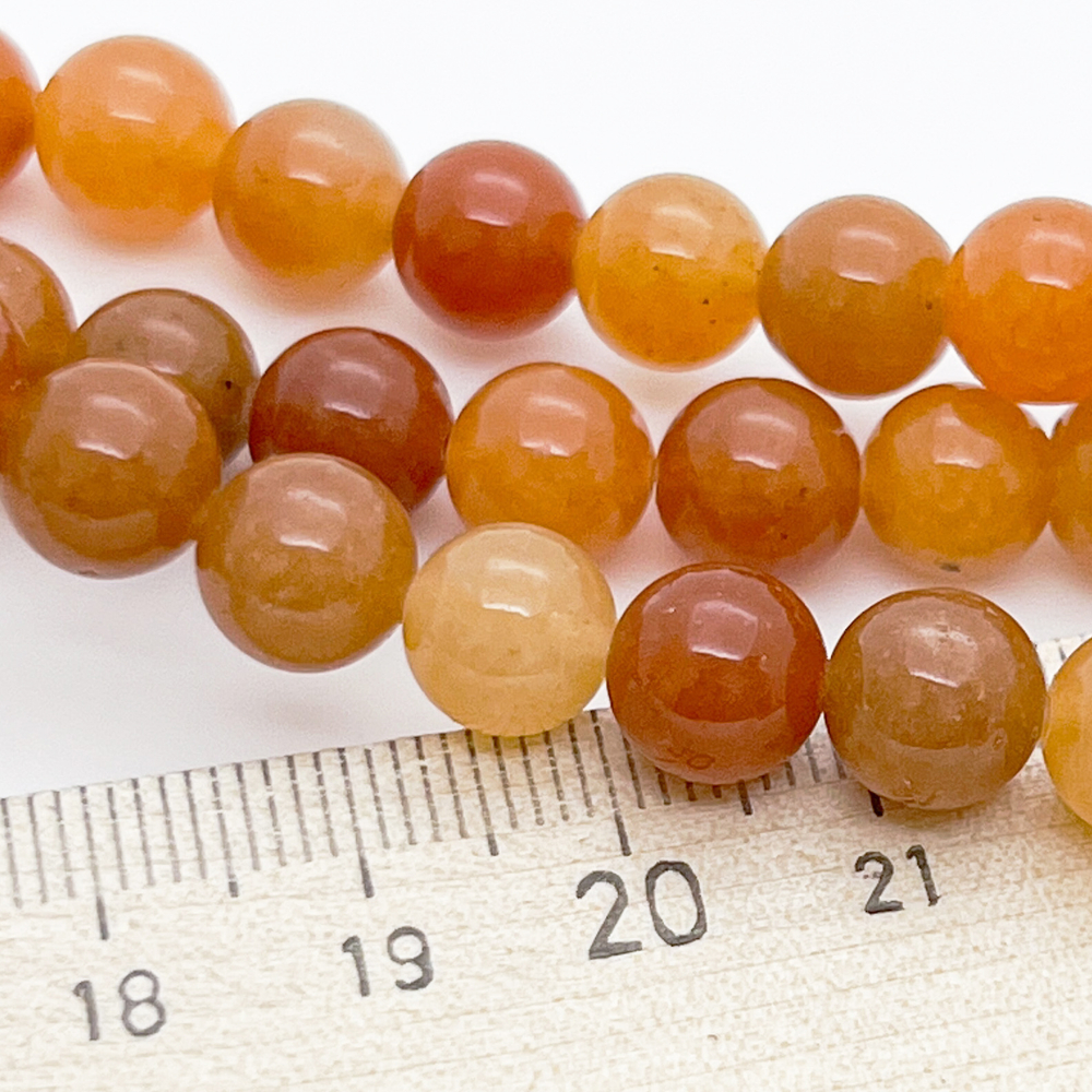 Авантюрин красный, размер 8,3-8,4 мм, цена за 22-23 шт (1/2 нити)