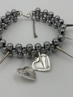 sharp medallion necklace