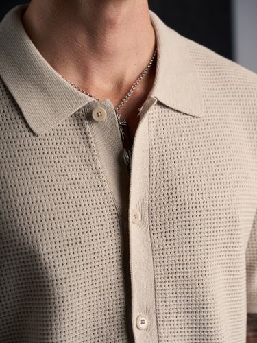 Бежевая трикотажная рубашка Laine с коротким рукавом