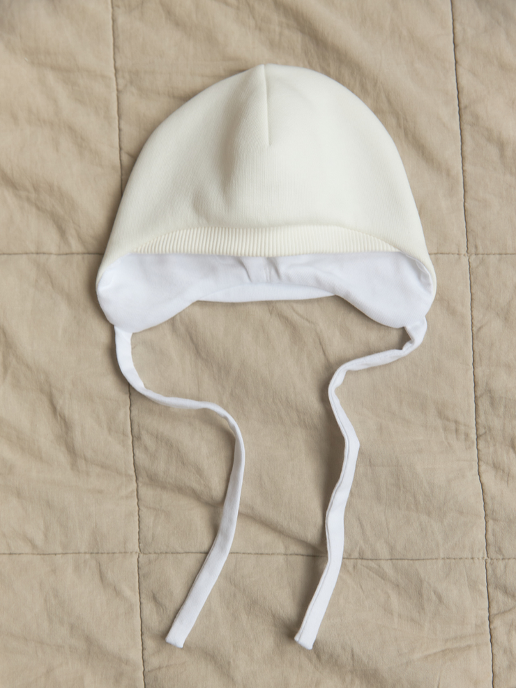 Шапочка трикотажная Молочный