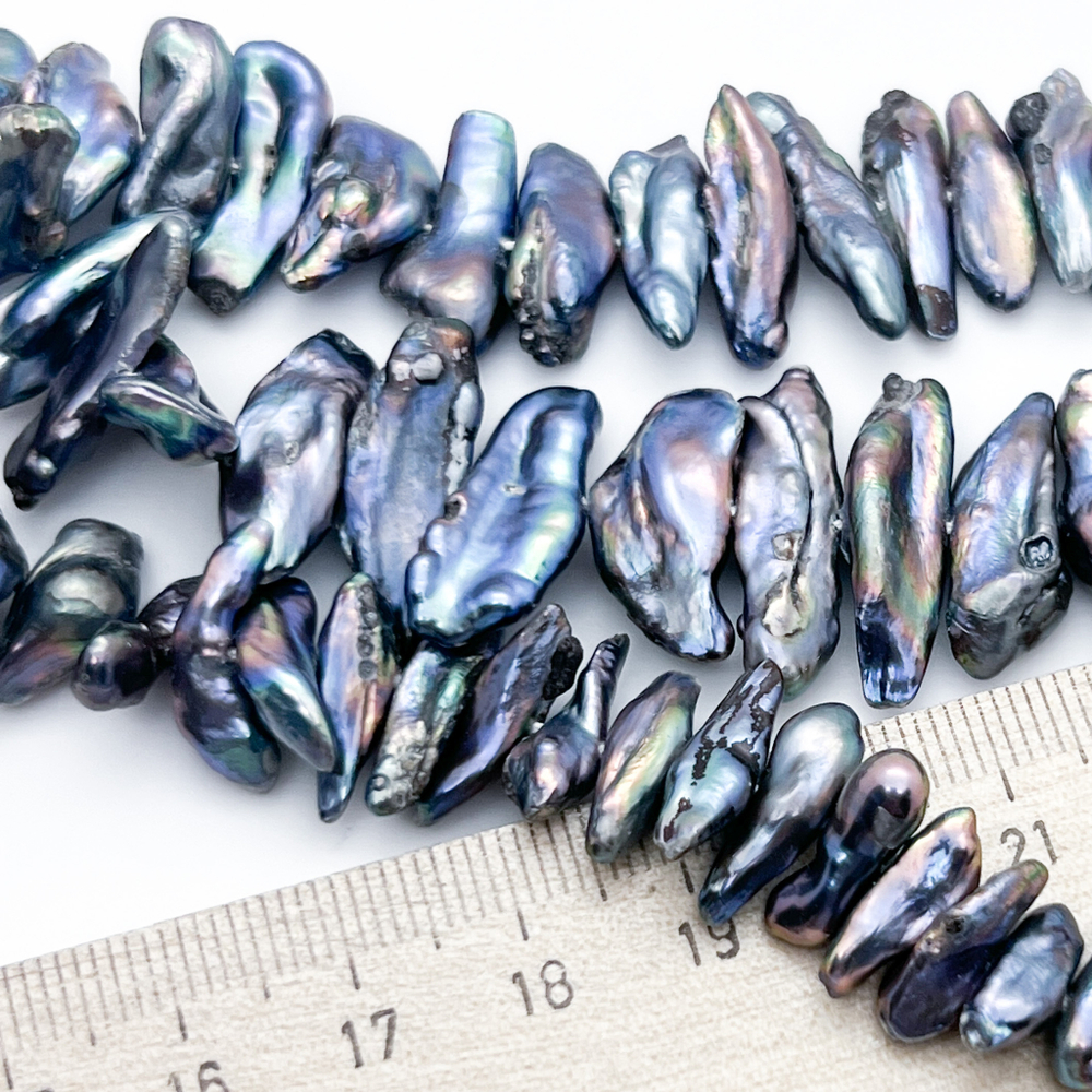 Жемчуг, размер около 12-20*5-8 мм, цена за отрезок 18 см (1/2 нити)