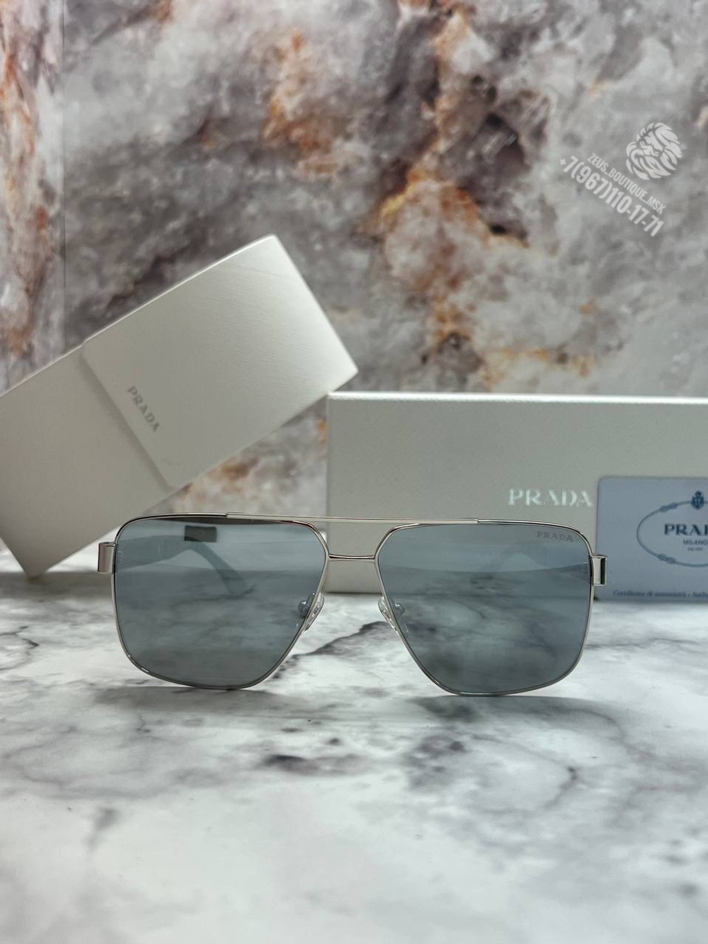 Солнечные очки Prada