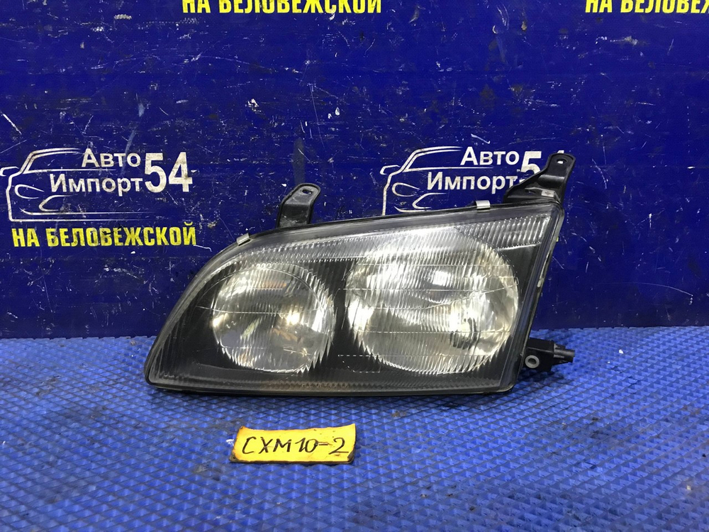 Фара передняя левая TOYOTA IPSUM 1997