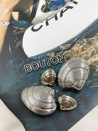 Пуговицы в форме ракушки серебристые