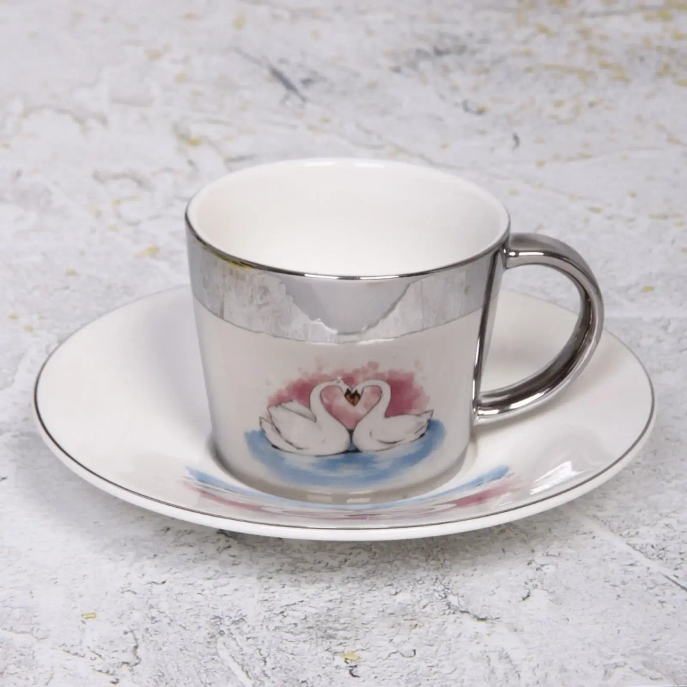 Чайная пара (зеркальная кружка 230мл+блюдце) анаморфный дизайн «Лебеди»