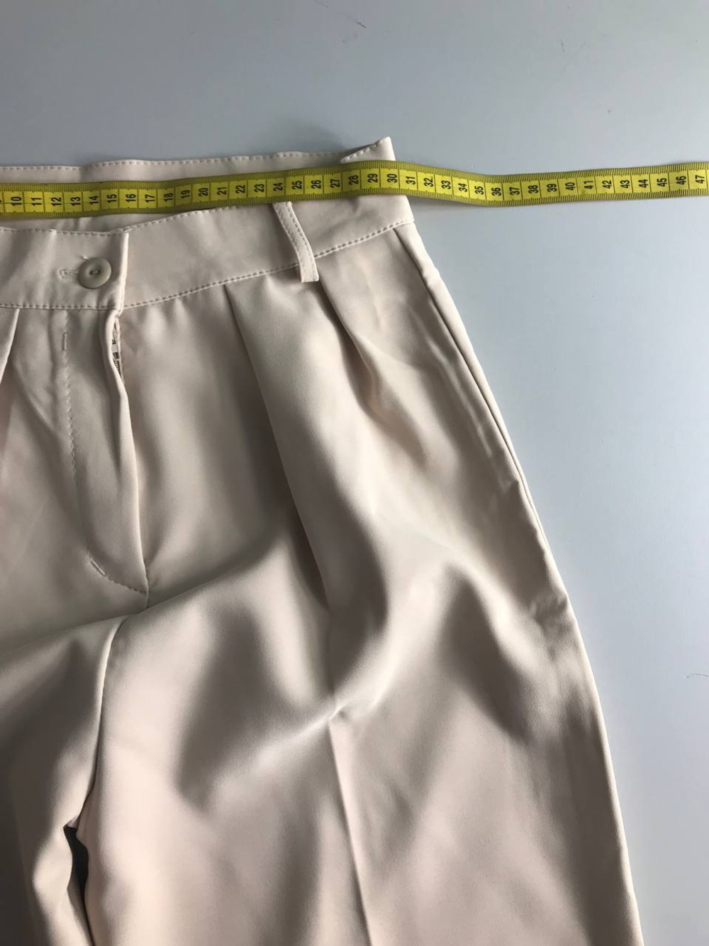 Брюки бежевого цвета, визуально на 42 размер, новые