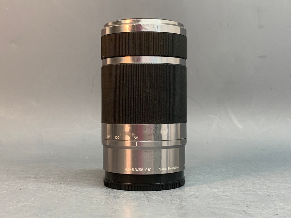 Sony 55-210mm f/4.5-6.3 E OSS внутри налет в виде точек