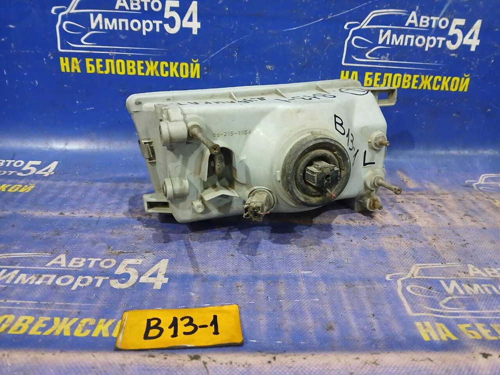 Фара передняя левая NISSAN SUNNY 1990