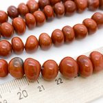 Яшма красная фриформ, размер около 7*9 мм, цена за отрезок 19 см (1/2 нити)