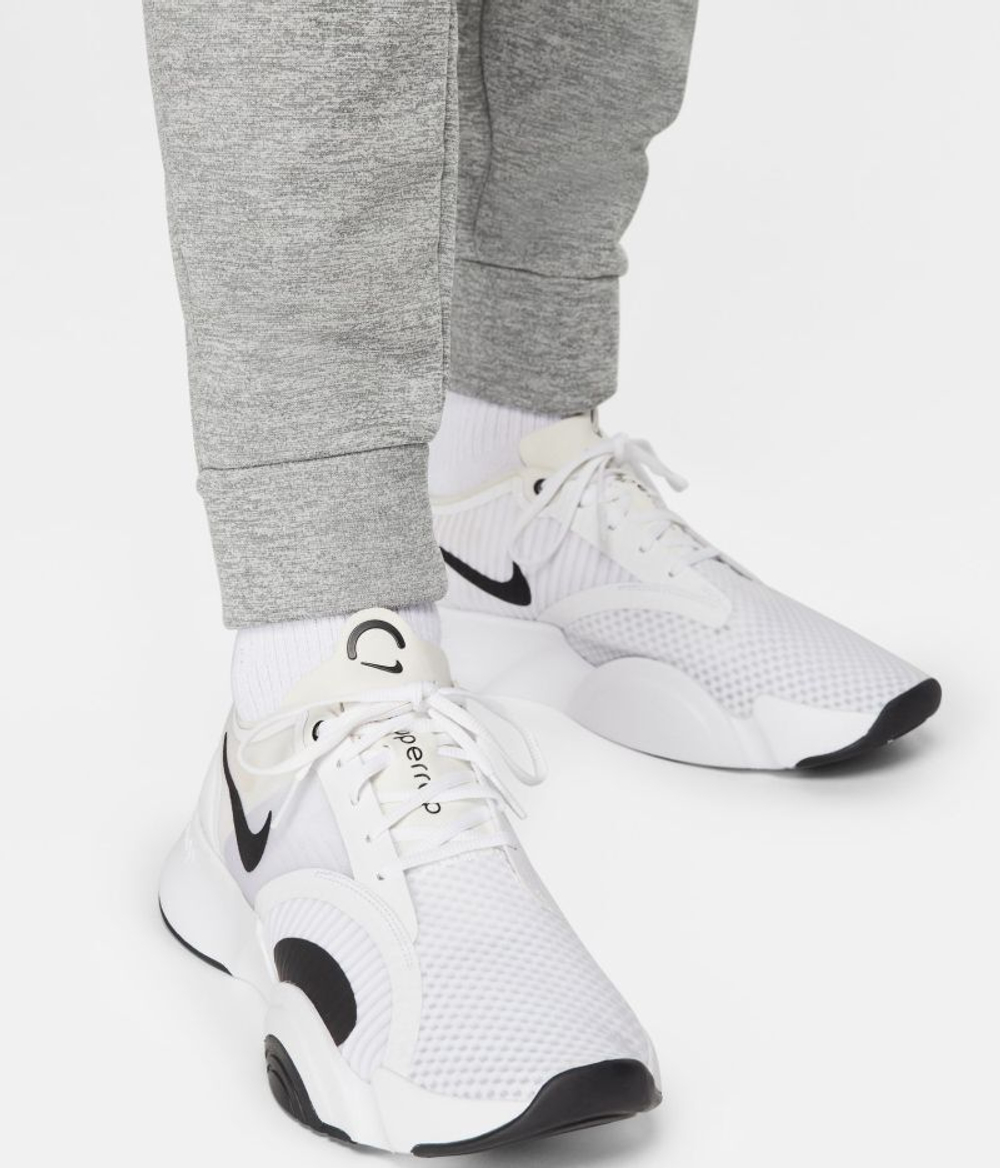 Теннисные брюки Nike Therma-FIT Tapered Fitness Pants - dark grey heather/particle grey/black - Gray