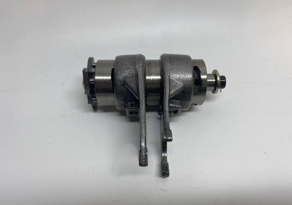 Копирный вал + вилки КПП двигатель 1P39FMA