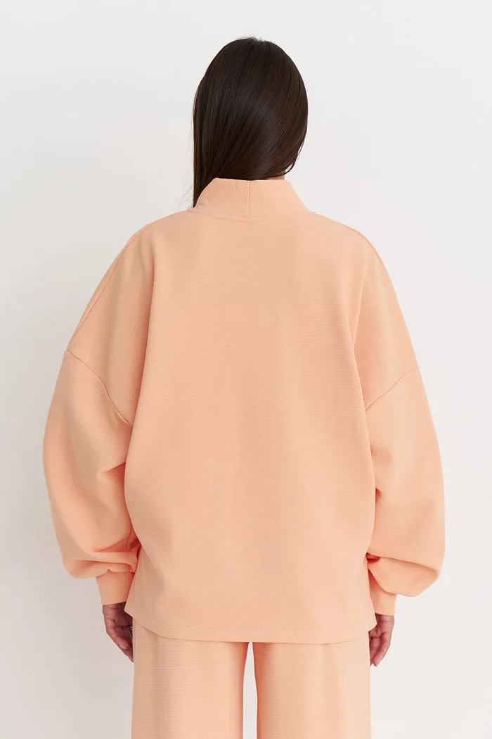 Лонгслив оверсайз из рифленого хлопка персикового цвета