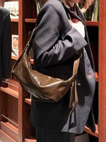 TYRA крем-шоколад - царапина вдоль шва 47