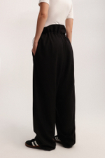 Брюки о-силуэта на кулисе