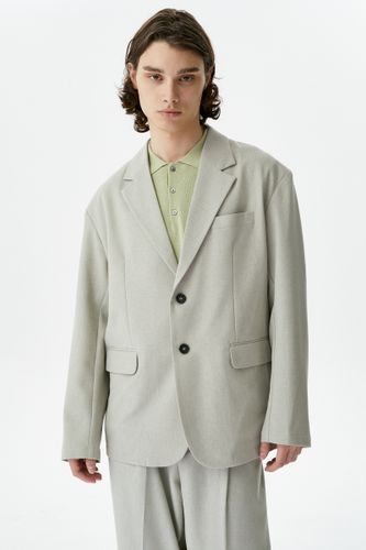 Бежево-серый брючный костюм Copper