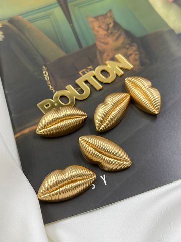 Пуговицы Скиап. объемные золотые губы