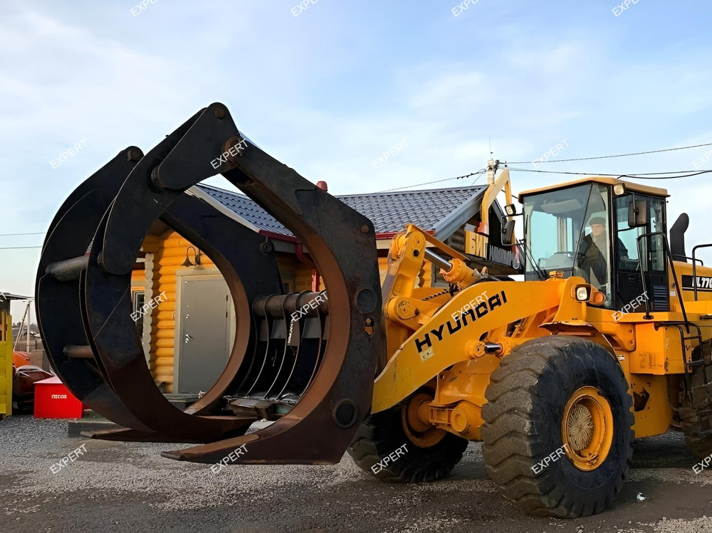 Бревнозахват на Фронтальный погрузчик Liebherr