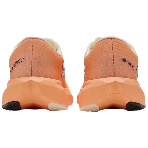 New Balance Rebel V4 Беговые кроссовки Низкие Оранжевый/белый Женские