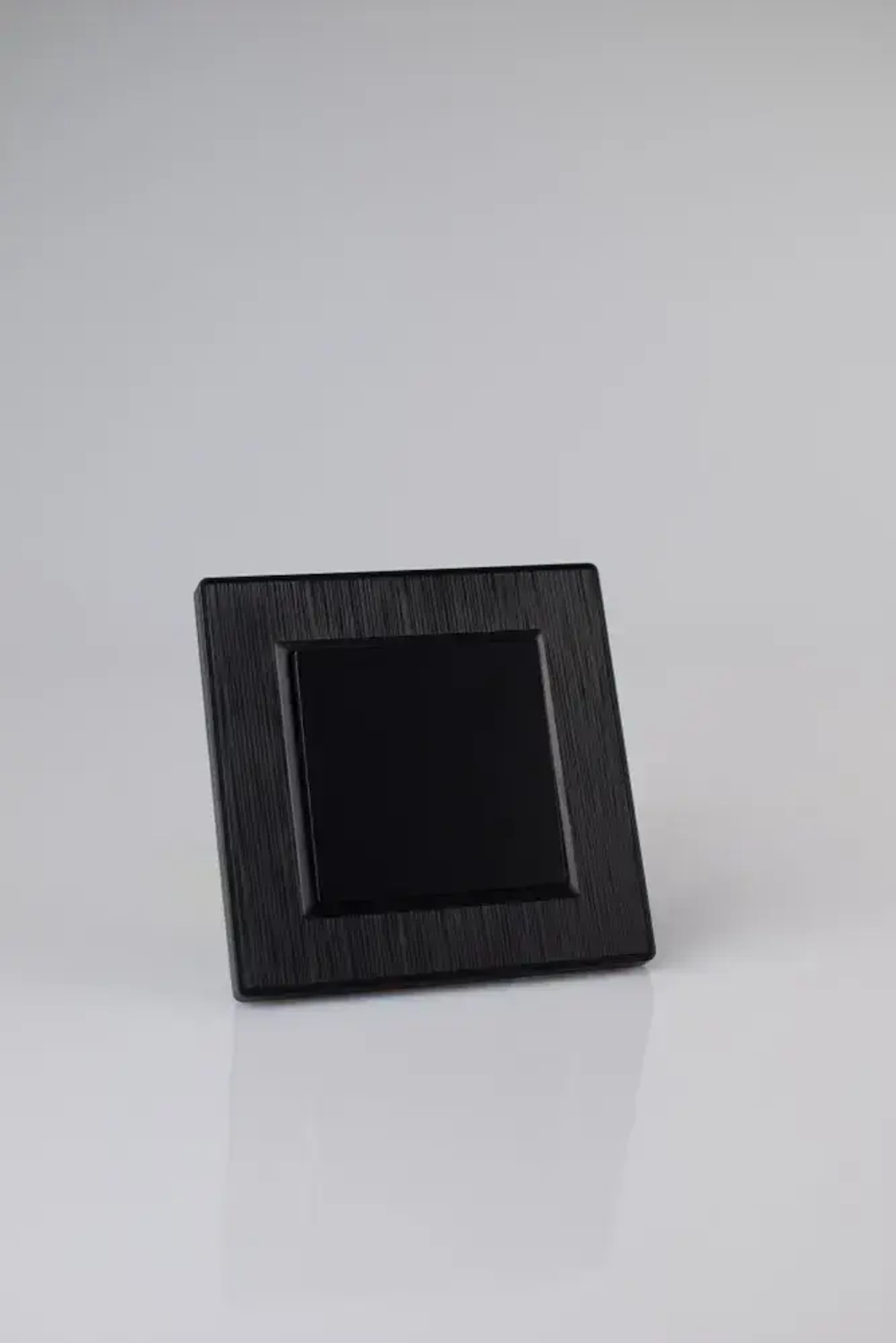 Выключатель одноклавишный черный