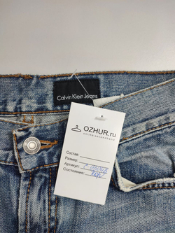 Джинсы Calvin Klein с потертостями 40 размер