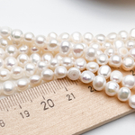 Жемчуг, размер около 5,5*6 мм, цена за отрезок 17 (1/2 нити)